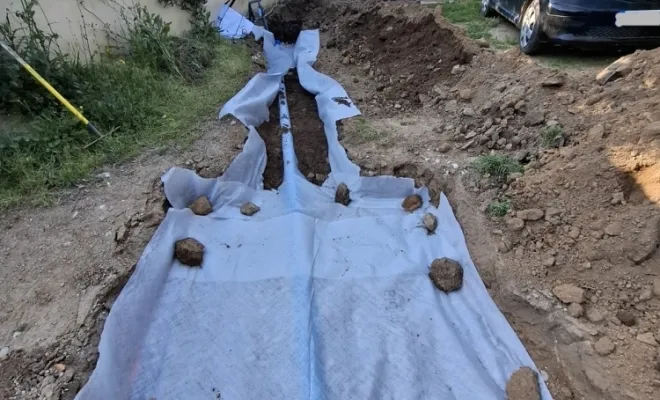 Mise en place d'un drain pour eau pluviale à Sotta